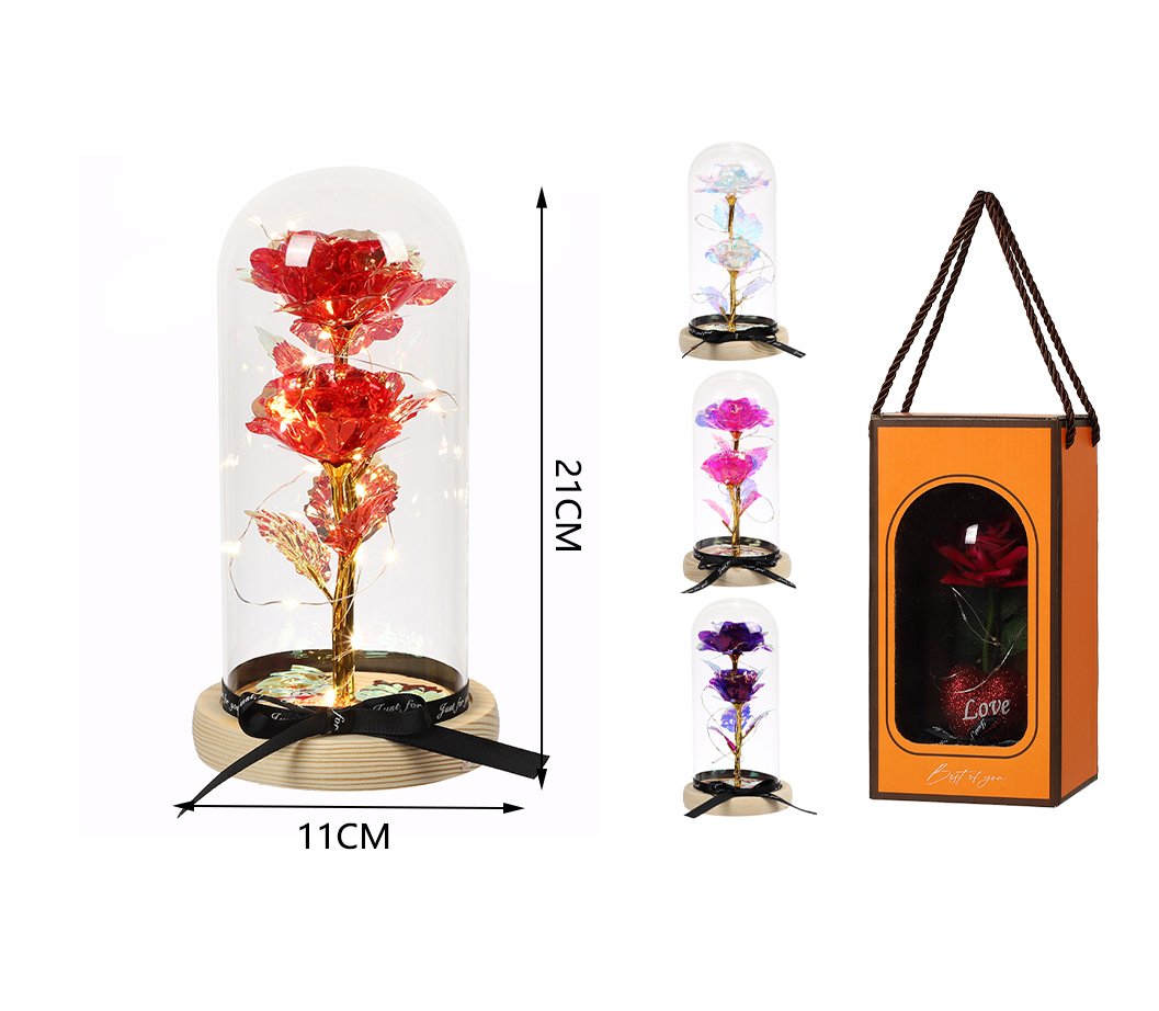 Flor premium en cúpula de cristal con luz