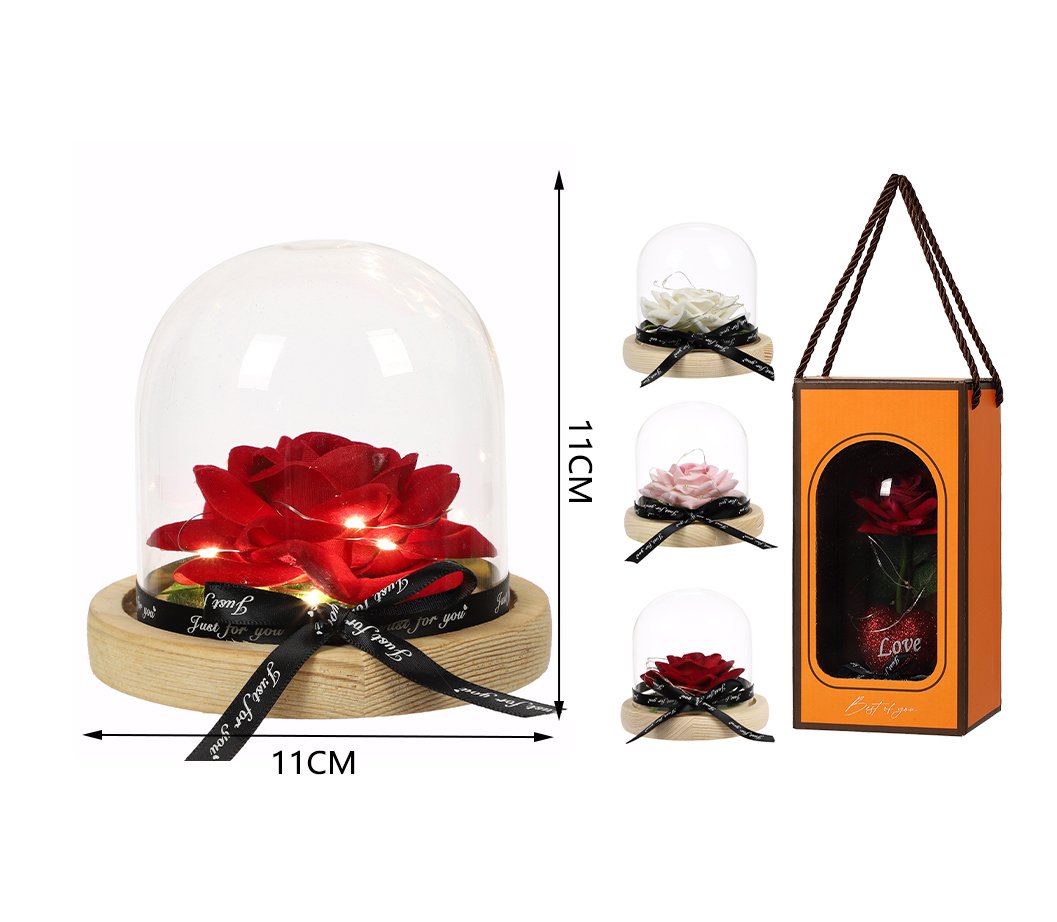 Flor premium en cúpula de cristal con luz