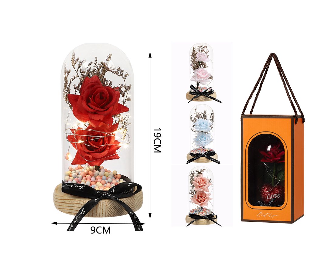 Flor premium en cúpula de cristal con luz